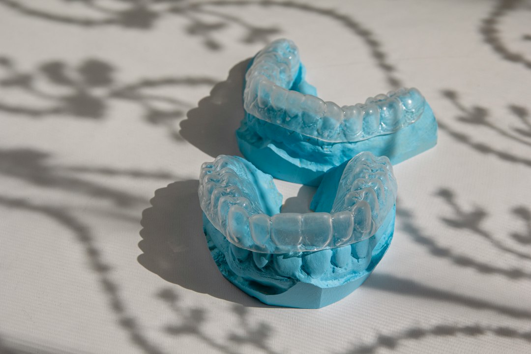 Custom-formed clear trays on blue stone models