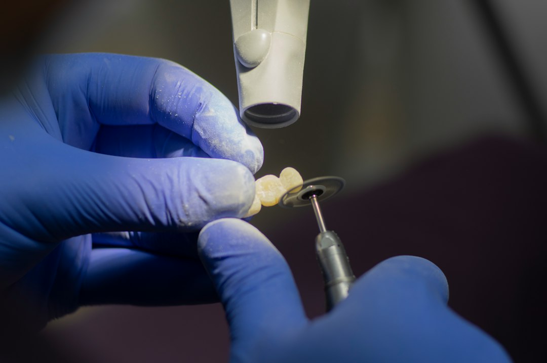 Dentist placing a provisional crown