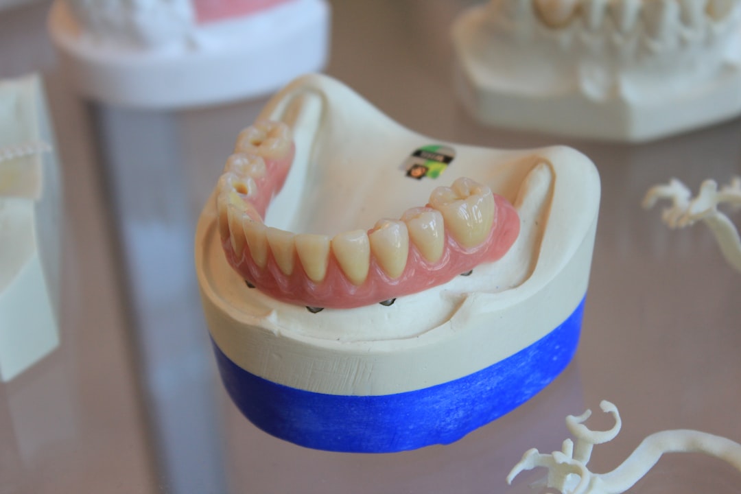 Finished dentures on a rack